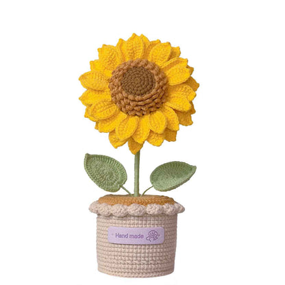 Handmade rotating crochet sunflower in a weighted pot